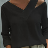 Top elegante da donna con scollo a V asimmetrico, perfetto per il lavoro e le feste