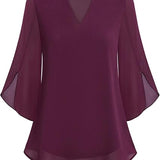 Blusa fluida con maniche a pipistrello – Eleganza e leggerezza