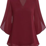 Blusa fluida con maniche a pipistrello – Eleganza e leggerezza