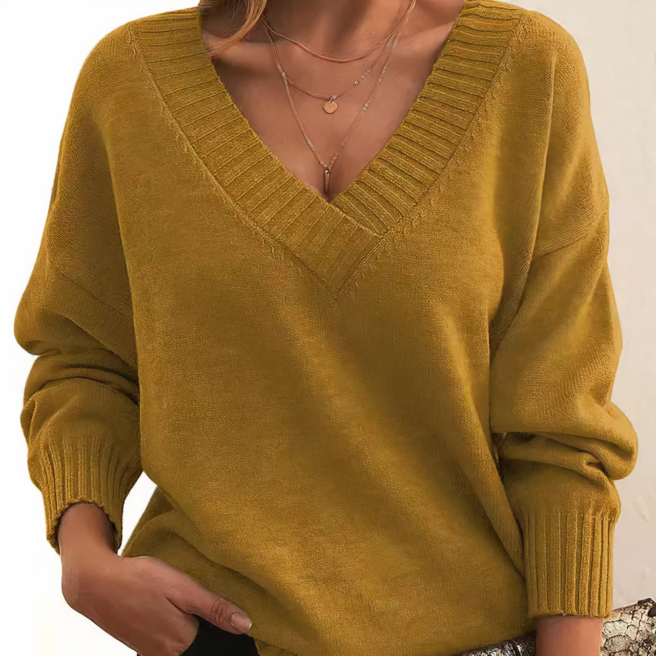 Maglione da donna in cashmere con scollo a V e maniche a palloncino morbide