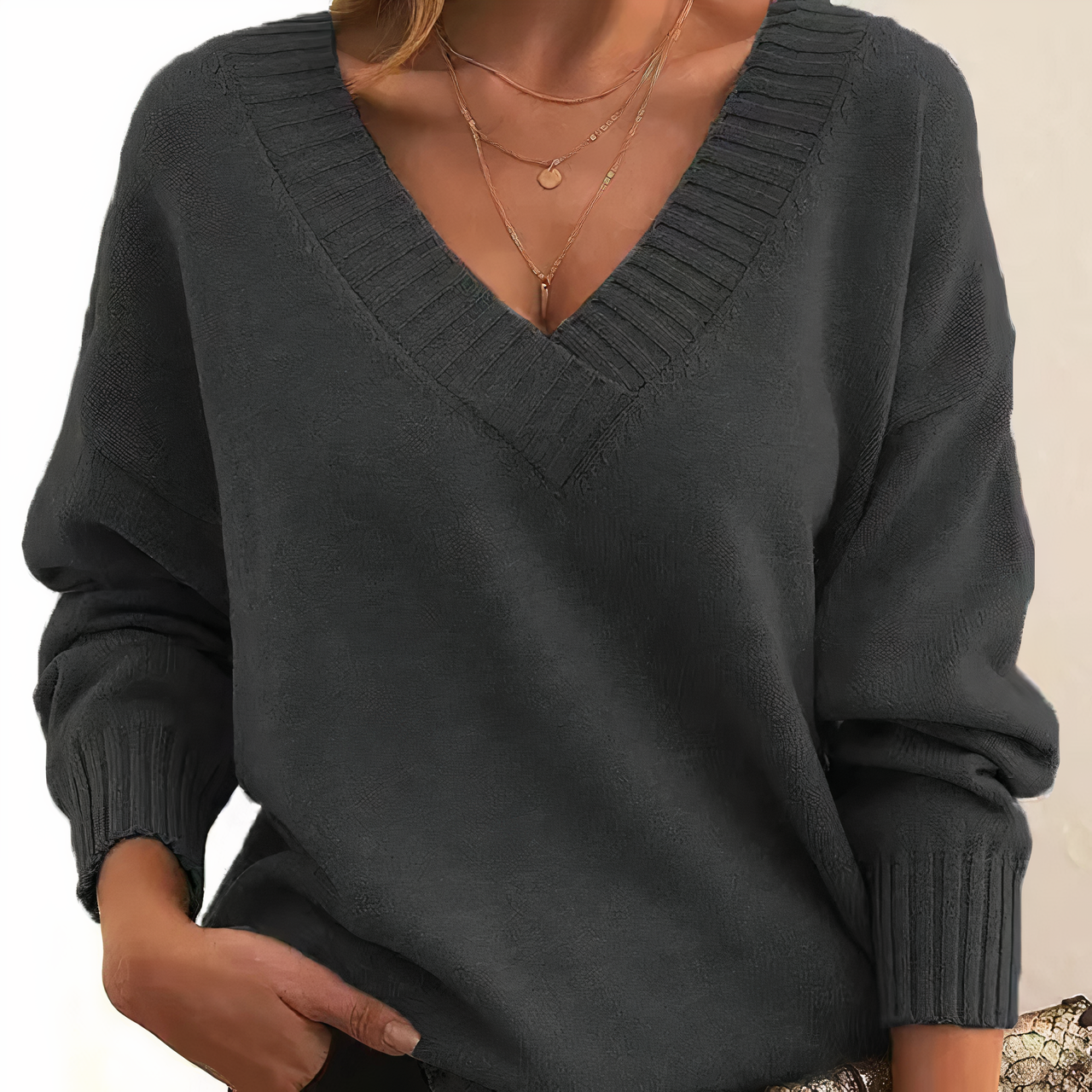 Maglione da donna in cashmere con scollo a V e maniche a palloncino morbide