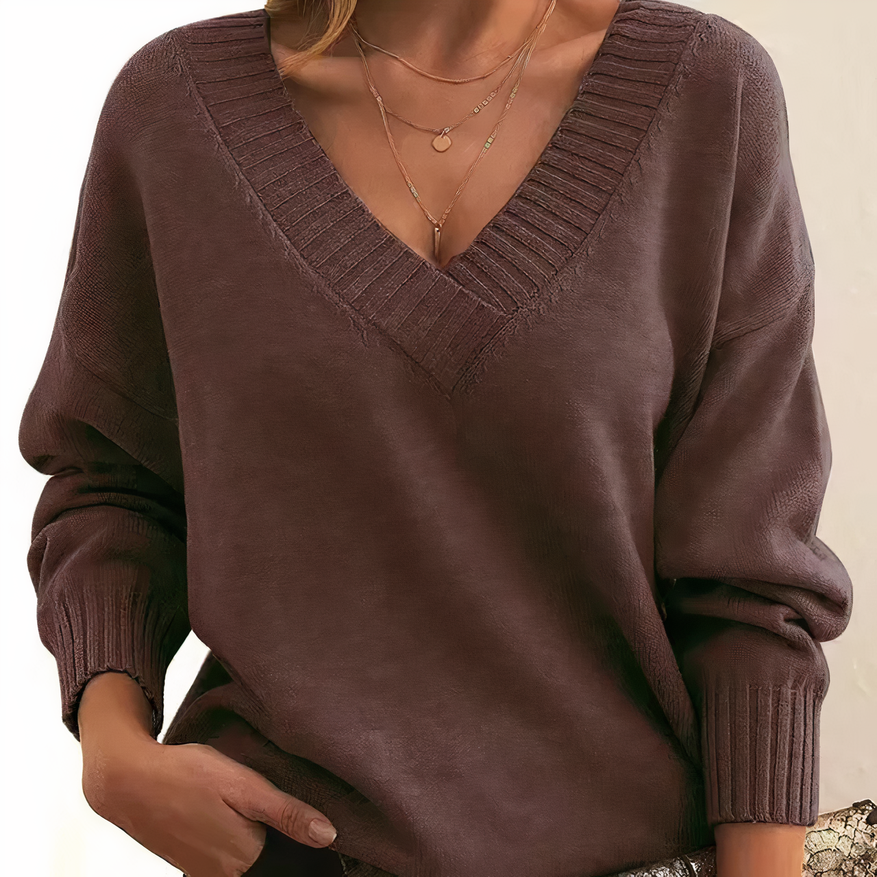 Maglione da donna in cashmere con scollo a V e maniche a palloncino morbide