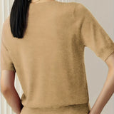 Maglione da donna in maglia fine con maniche corte e bordi a coste