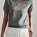 Maglione da donna in maglia fine con maniche corte e bordi a coste