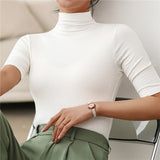 Donna - Top dolcevita slim fit a mezza manica