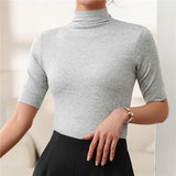 Donna - Top dolcevita slim fit a mezza manica