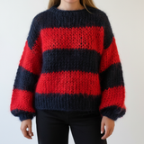 Maglione donna a maglia grossa con ampie righe e maniche a palloncino