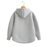 Felpa con cappuccio da donna | Taglio oversize e cerniera lampo