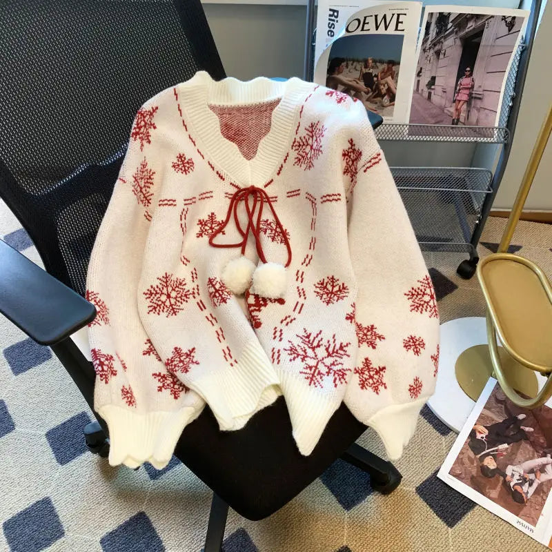 Maglione natalizio da donna con scollo a V – Maglia con laccetti e pompon per look invernali festivi