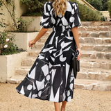 Vestito floreale da donna con scollo a V – abito midi estivo elegante a maniche corte