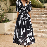 Vestito floreale da donna con scollo a V – abito midi estivo elegante a maniche corte