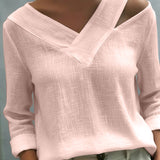 Top elegante da donna con scollo a V asimmetrico, perfetto per il lavoro e le feste