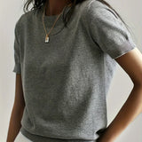 Maglione da donna in maglia fine con maniche corte e bordi a coste