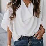 Camicetta da donna con maniche a pipistrello – Elegante, fluida e casual, perfetta per il lavoro.