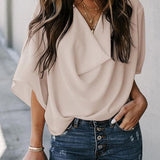 Camicetta da donna con maniche a pipistrello – Elegante, fluida e casual, perfetta per il lavoro.