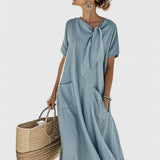 Abito elegante da donna senza maniche – Silhouette fluida e raffinata