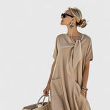 Abito elegante da donna senza maniche – Silhouette fluida e raffinata